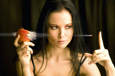 Portrait of woman holding ice cream