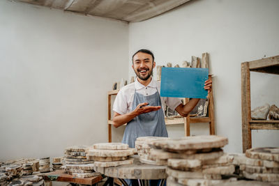 Portrait of man working at home