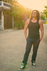 Portrait of smiling young woman standing outdoors