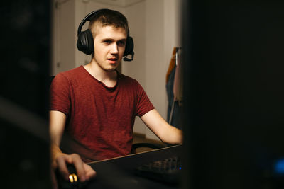 Portrait of young man looking away