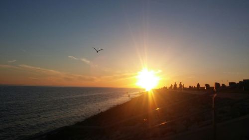 Sunset over calm sea