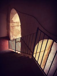 Illuminated built structure against sky