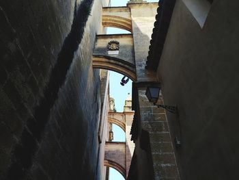 Canal amidst buildings