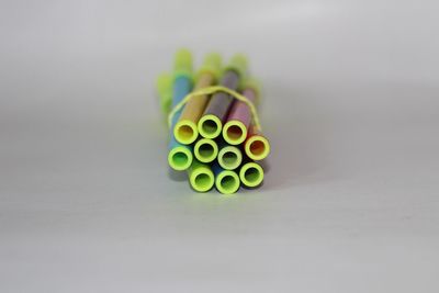 Close-up of multi colored pencils on table
