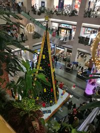 High angle view of christmas tree in shopping mall