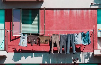 Clothes drying against building