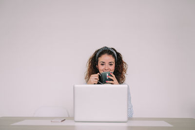 Portrait of woman using smart phone