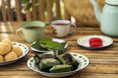 Lemper bakar, grilled indonesian rice cake with shredded chicken inside. 