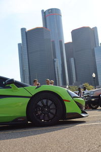 Vintage car against buildings in city