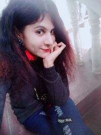 Portrait of smiling young woman