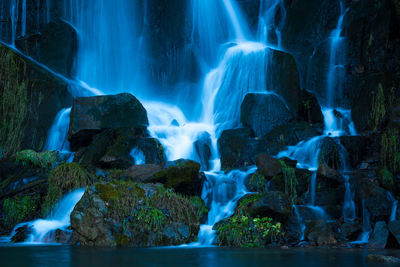 View of waterfall in forest