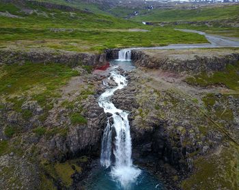 Scenic view of waterfall in forest