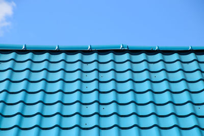 Low angle view of building against blue sky