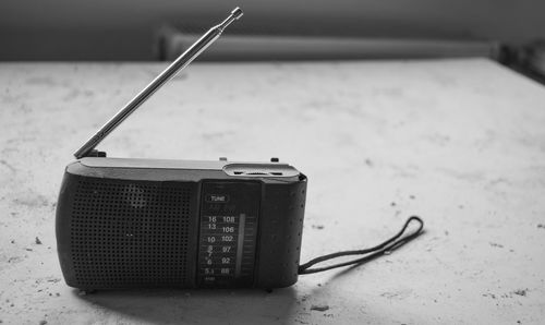 Close-up of radio on table
