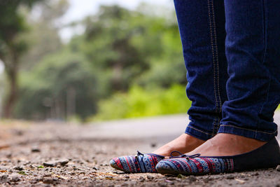 Low section of woman with casual clothing