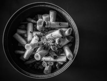 High angle view of cigarette in bowl on table