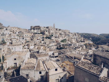 Aerial view of town against sky