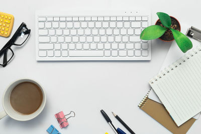 High angle view of coffee cup on table