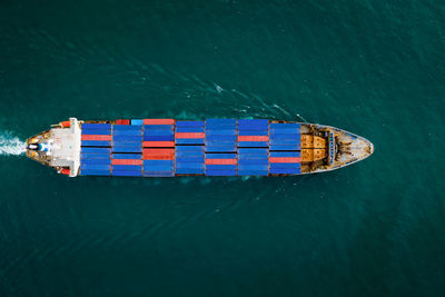 High angle view of ship sailing in sea