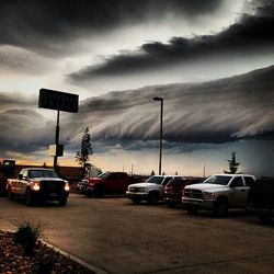 View of road against cloudy sky