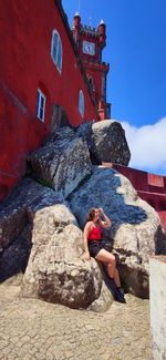 Man sitting on rock