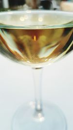 Close-up of wineglass served on table