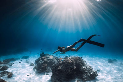 Man swimming in sea