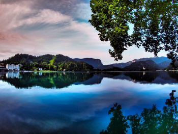 Scenic view of lake against sky during sunset