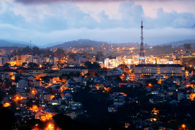 High angle view of illuminated buildings in city