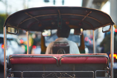 Rear view of carousel in amusement park