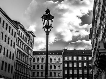 Low angle view of street light against sky in city