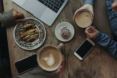 High angle view of coffee cup on table