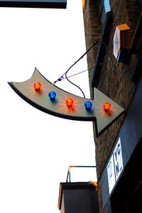 Low angle view of built structure against clear blue sky