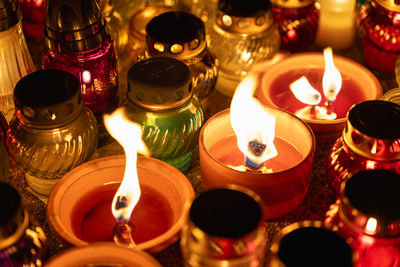 Close-up of illuminated tea light candles