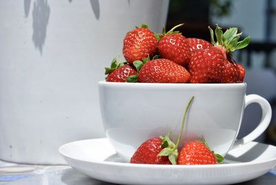 Close-up of strawberries in bowl on table