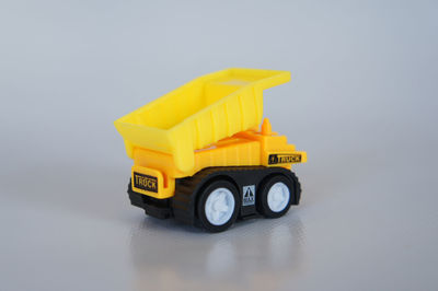 Close-up of toy car against white background