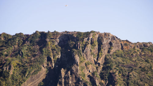 Scenic view of rocky mountains against clear sky