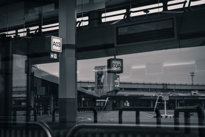 Low angle view of information sign on train in city