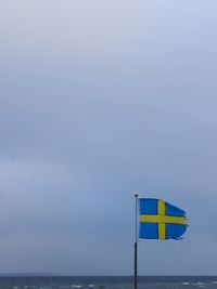 Scenic view of blue sea against sky