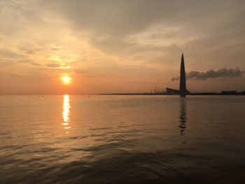 Scenic view of sea against sky during sunset