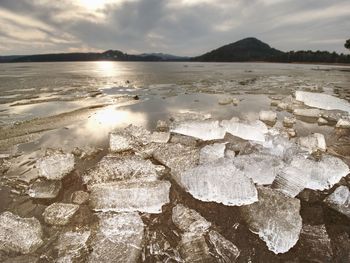 Broken floes and iceberg.  ice piece on freshwater ice that has broken off a glacier or an ice shelf