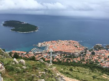 Scenic view of sea against cloudy sky
