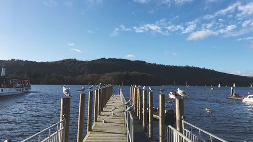 Pier over sea against sky