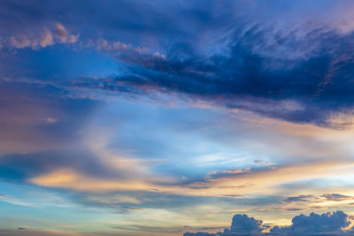 Low angle view of dramatic sky during sunset