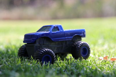 Close-up of toy car on grass