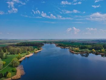 Scenic view of landscape against blue sky