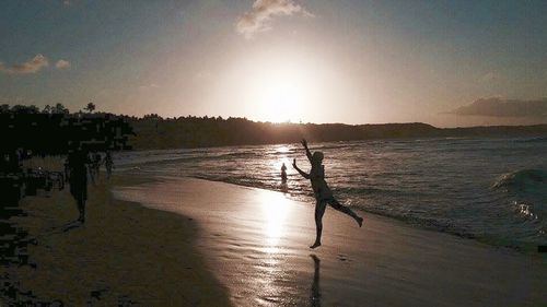 Scenic view of sea at sunset