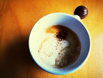 High angle view of coffee cup on table