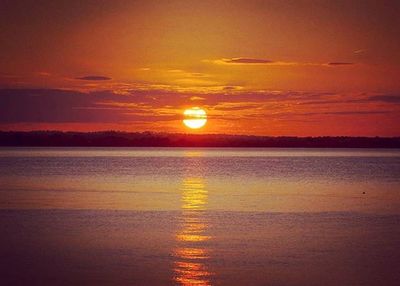 Scenic view of sunset over sea