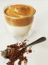 Close-up of coffee cup on table